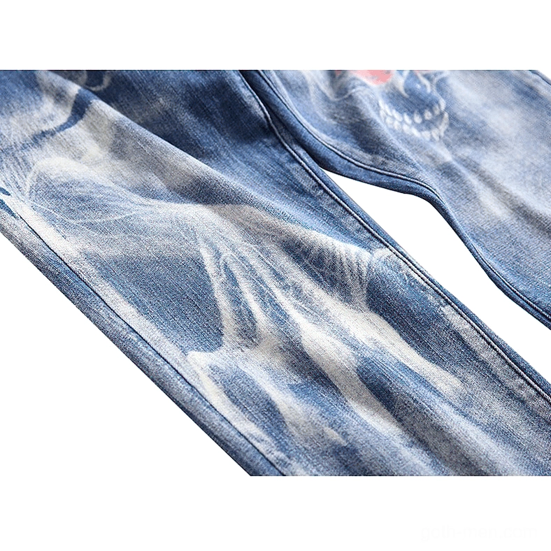 Navy gothic skull denim jeans with ghost hand print and alternative fashion aesthetic