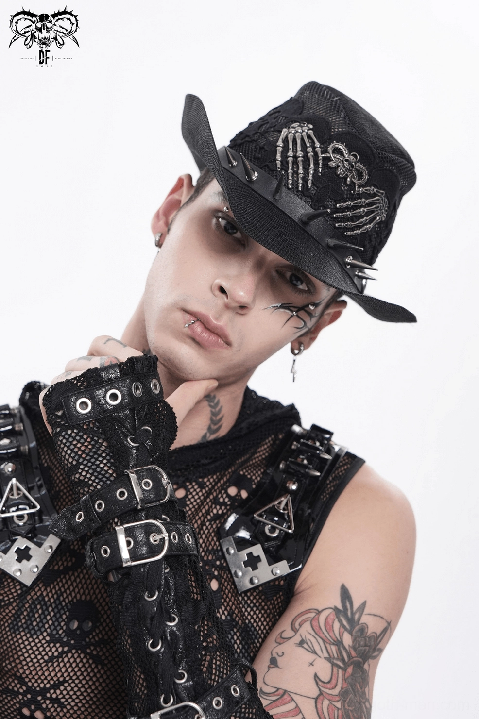 Gothic skull lace hat with metal spike trim and skeleton hand accents, alternative fashion piece