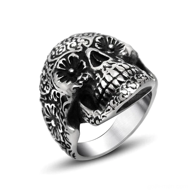 Memento mori skull ring with floral engraving, antique silver stainless steel gothic jewelry, front three-quarter view