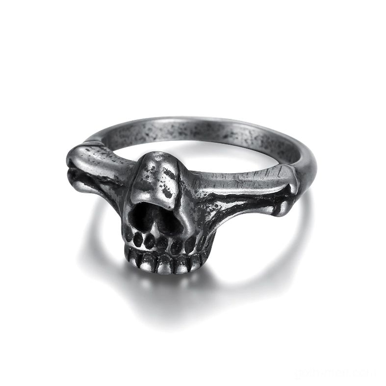 Black stainless steel gothic skull ring frontal view showing detailed skeleton carving and memento mori design