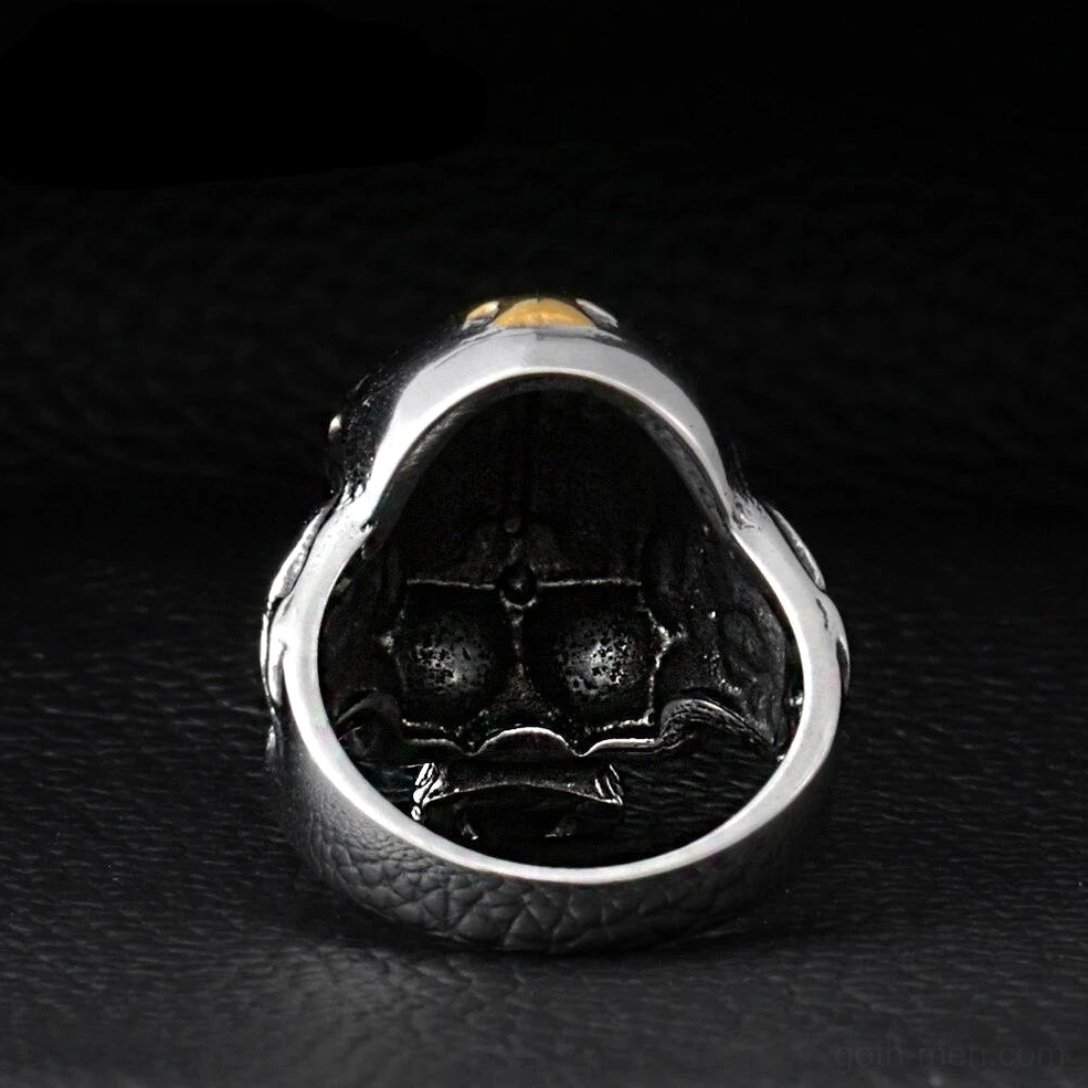 Interior view of gothic skull ring showing textured inner band with engraved skull pattern details and craftsmanship