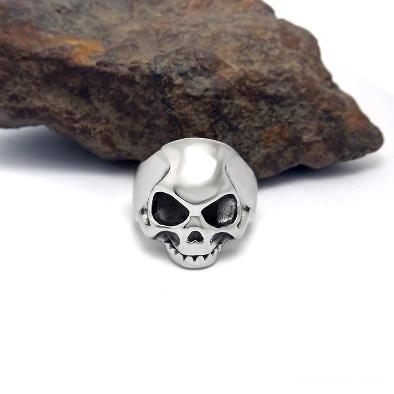 Gothic memento mori skull ring direct front view, complete carved skeletal structure with intricate details, silver stainless steel band