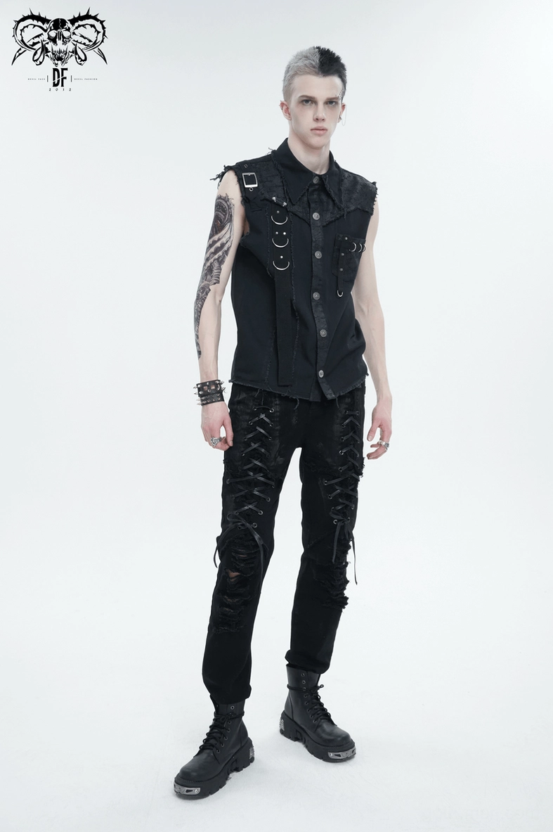 Black gothic button-front sleeveless shirt detail showing layered metal embellishments and textile contrast