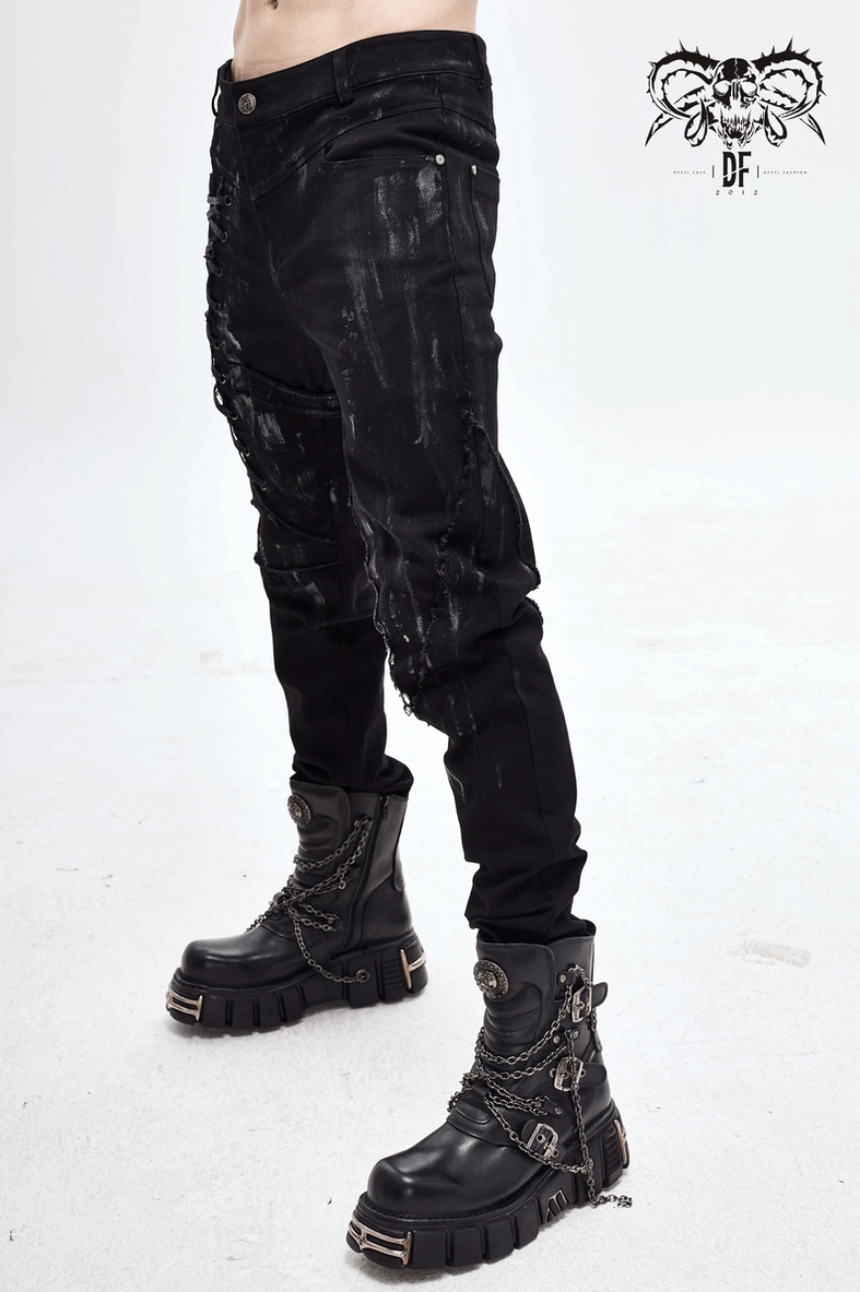 Back view perspective of black slim-fit gothic lace-up pants showing rear construction detail
