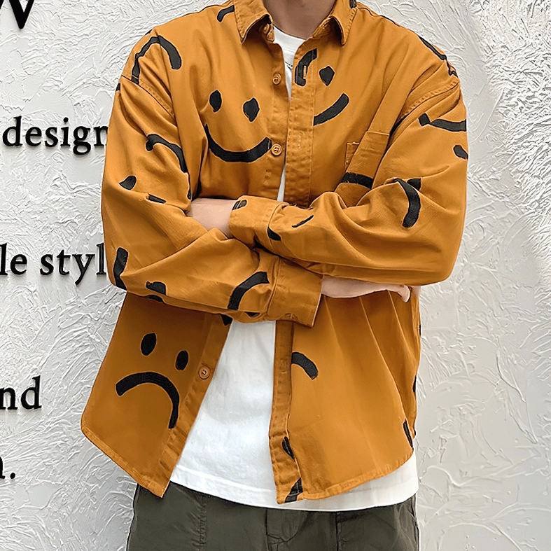Black gothic smiley shirt front detail, white graffiti smile print pattern, button placket and chest pocket construction