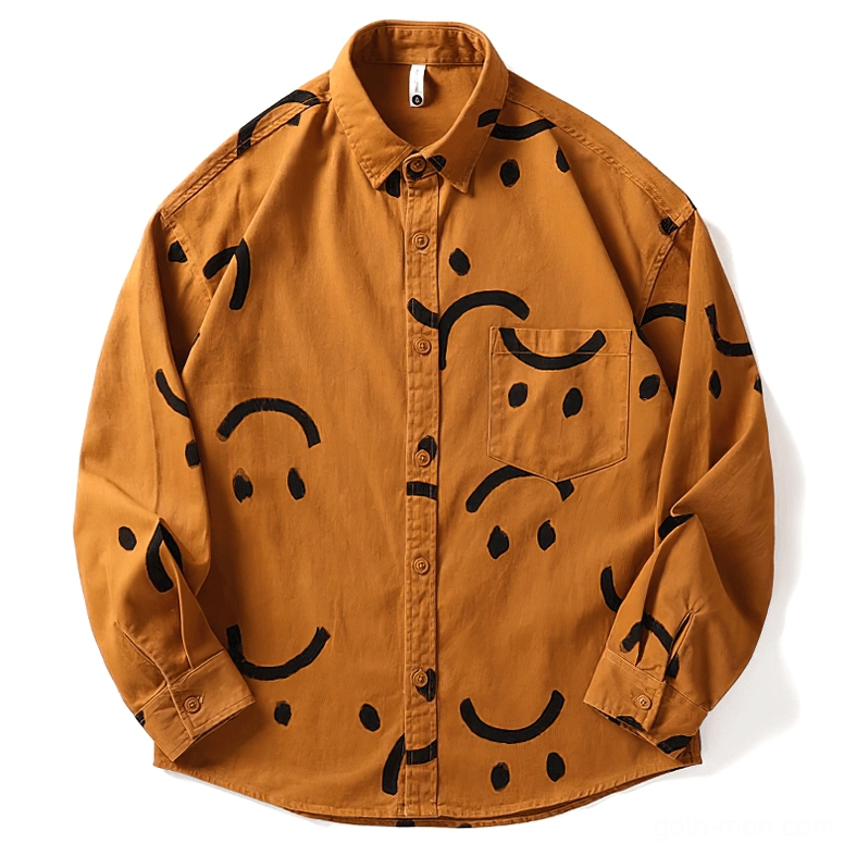 Burnt orange gothic smiley print shirt front flat lay, black graffiti smile face design, premium cotton fabric with chest pocket detail