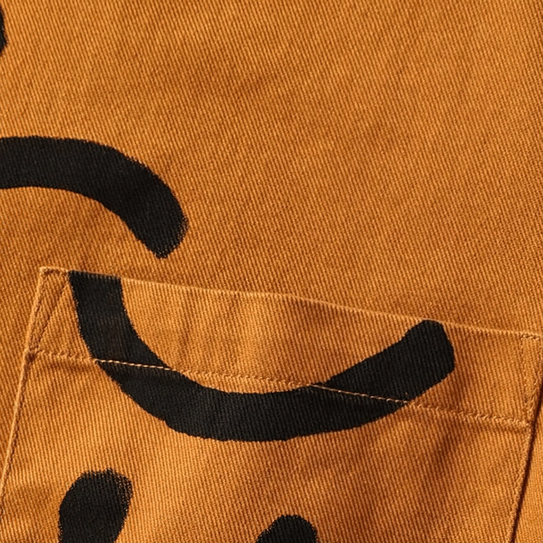 Full body view of gothic smiley shirt worn, casual alternative styling inspiration, goth fashion aesthetic