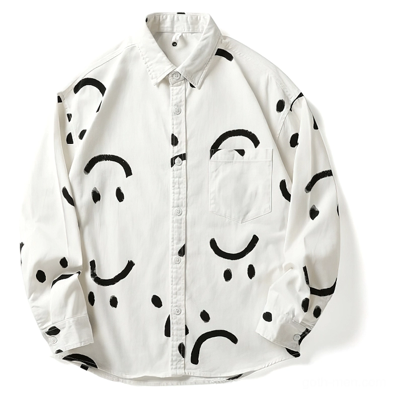 White gothic smiley print shirt front flat lay, black hand-drawn smiles on ivory cotton, button front closure and chest pocket