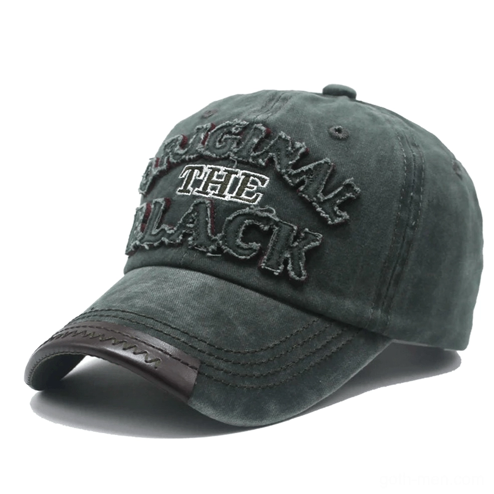 Dark forest green monochrome washed gothic snapback with leather-like brim accent and embroidered letter detail