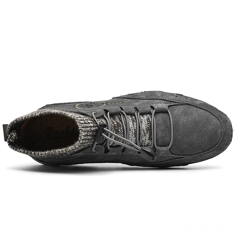 Gothic casual sneaker sole and interior showing knitted sock lining and flexible rubber outsole - top-down view