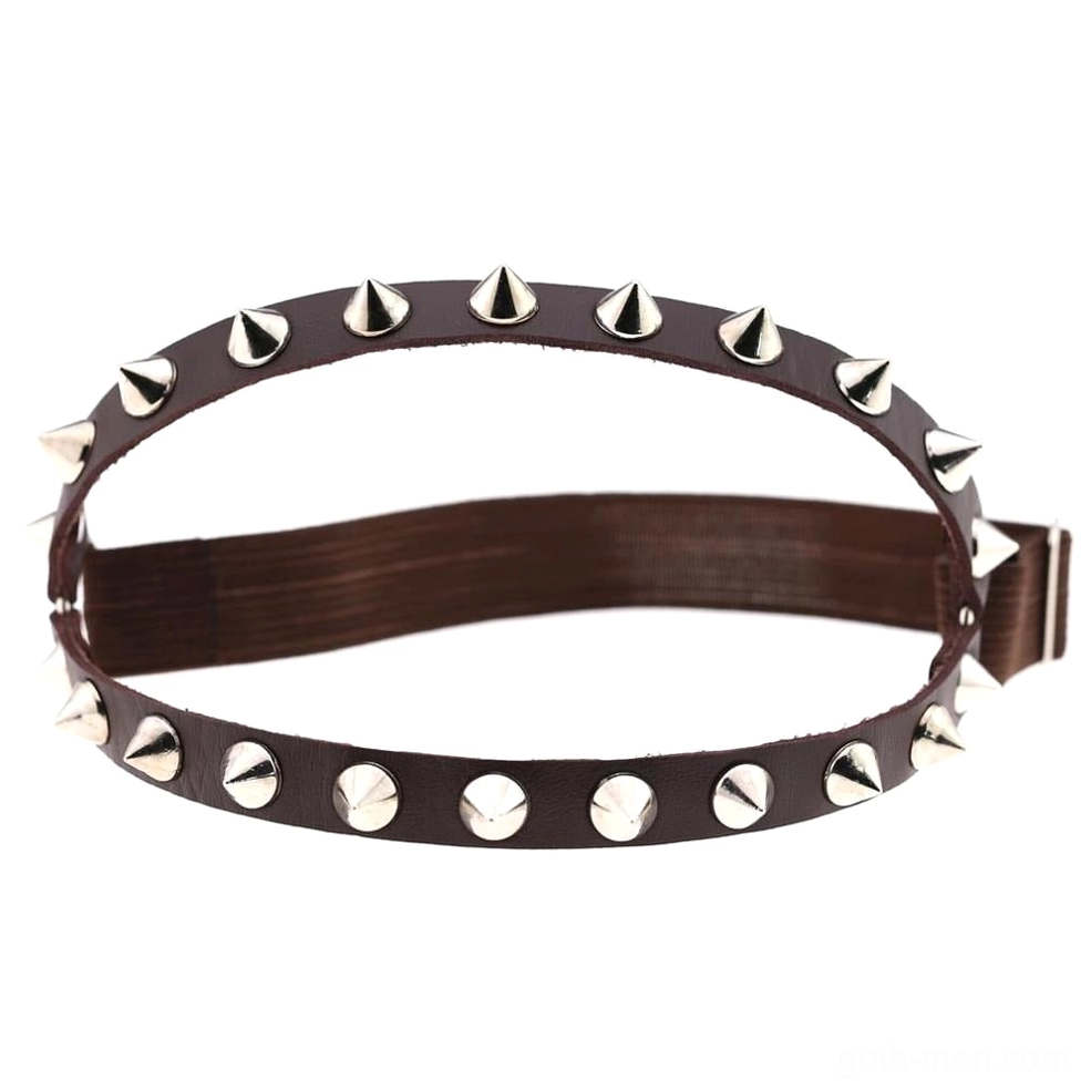 Dark brown leather gothic knee garter with silver metal studs and adjustable buckle closure, studio flat lay
