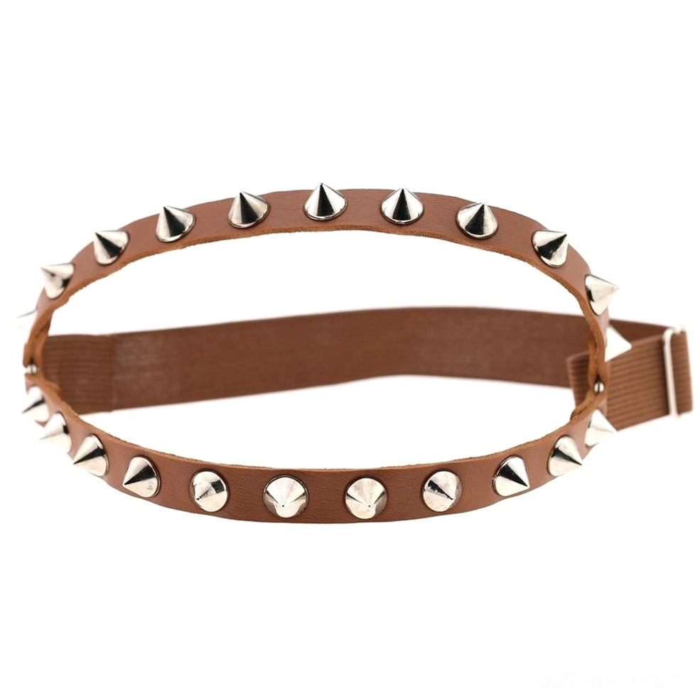 Light brown khaki leather spiked knee garter with mixed silver studs and adjustable closure, studio display view