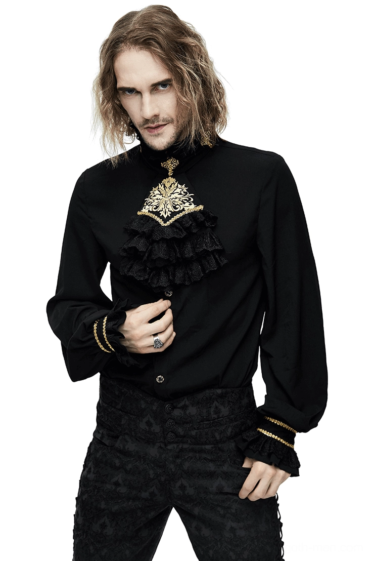Black gothic men's stand collar shirt with gold embroidered chiffon ruffle chest piece, front view on model with long dark hair