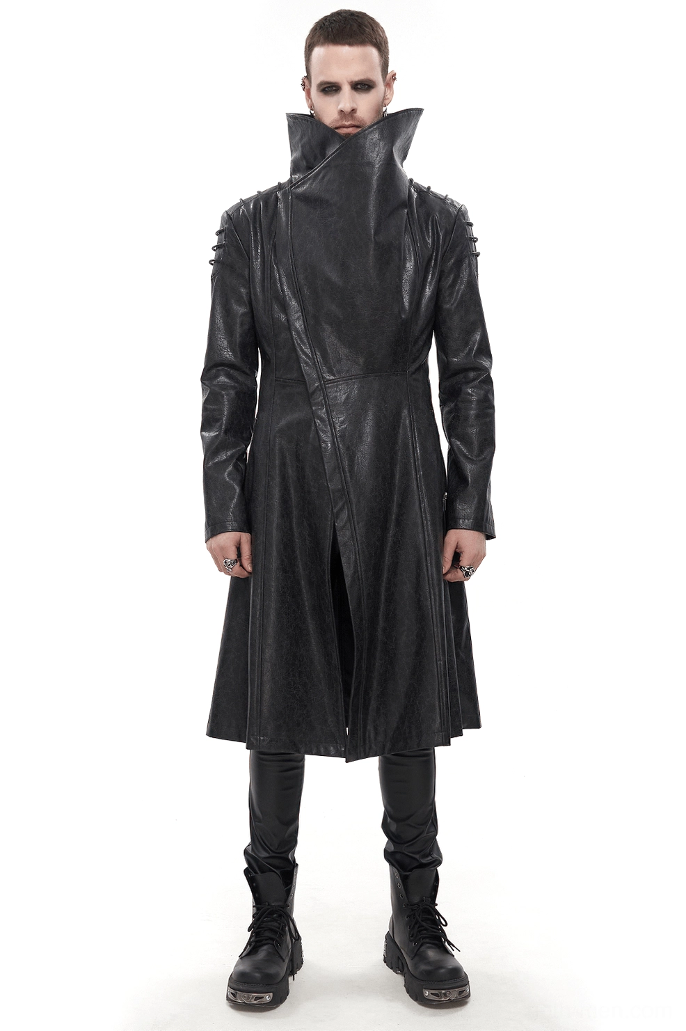 Male model wearing black gothic stand collar trench coat with spiked shoulders, frontal view showing distressed faux leather and tall structured collar