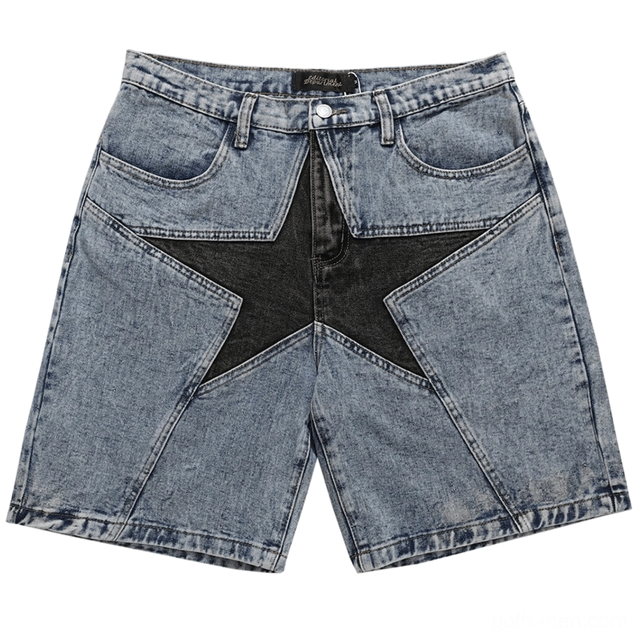 Light blue gothic denim shorts with contrasting black star patchwork design, front flat lay view with studio background