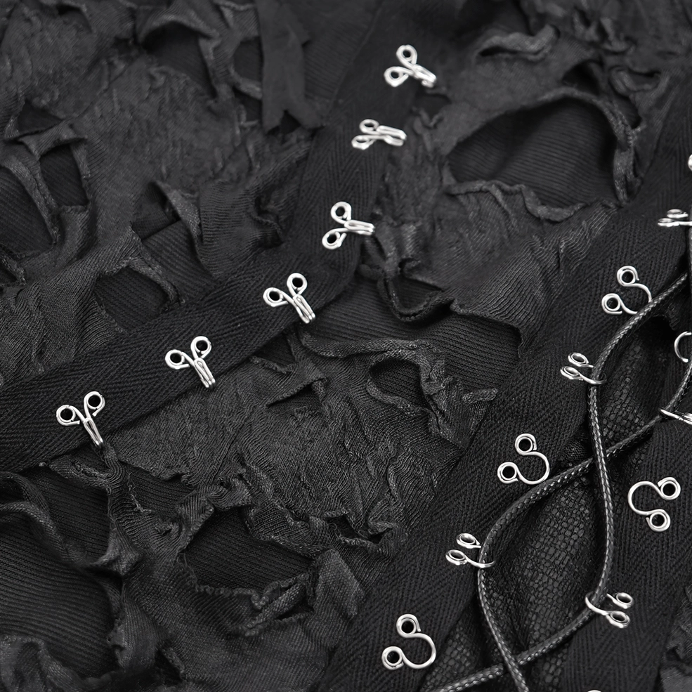 Close-up detail of black gothic sweatshirt metal hook-and-eye closure fasteners with distressed frayed fabric texture