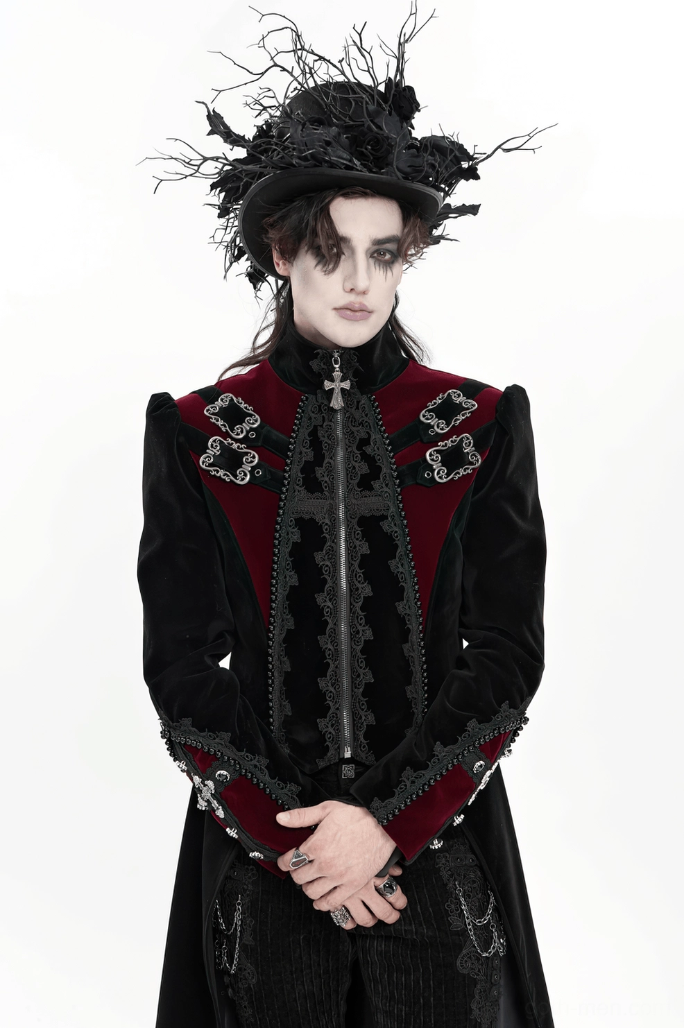 Side angle view of gothic velvet tailcoat showing lapel construction, stand collar, and structured fit on male model