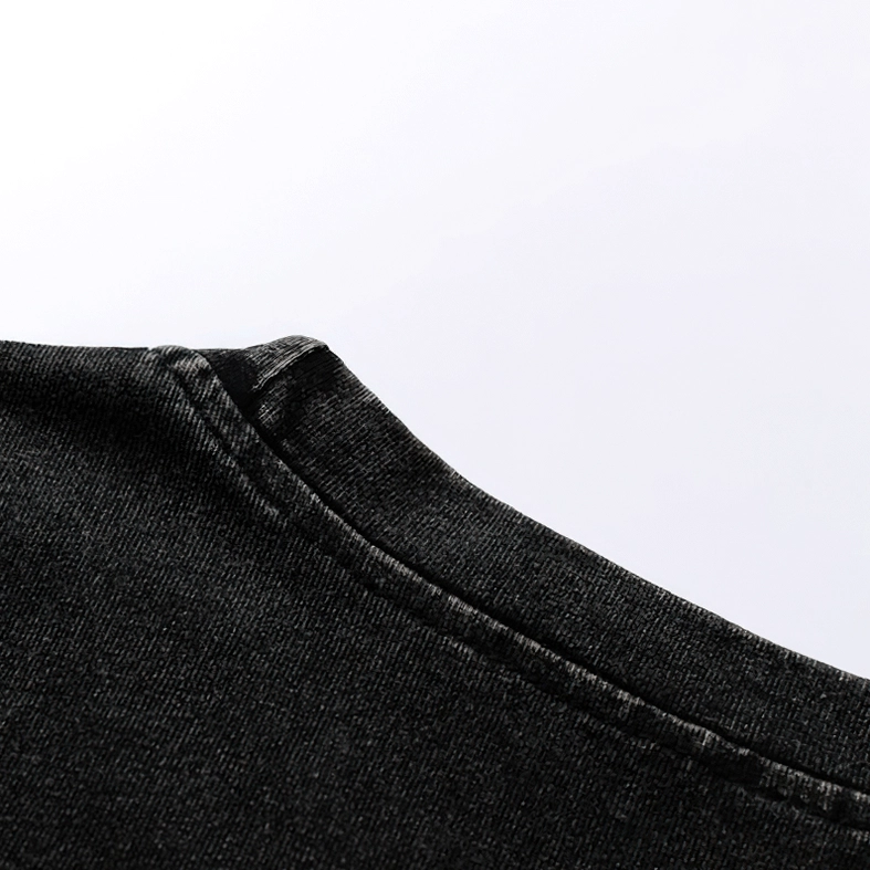 Armhole seam detail on black gothic tank, tailored stitching and trim