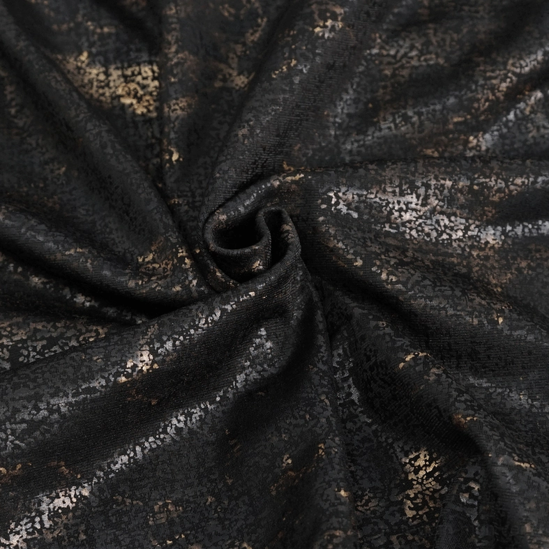 Neckline close-up of men's gothic tank top showing deep v-cut lace-up system and distressed black marbled fabric texture
