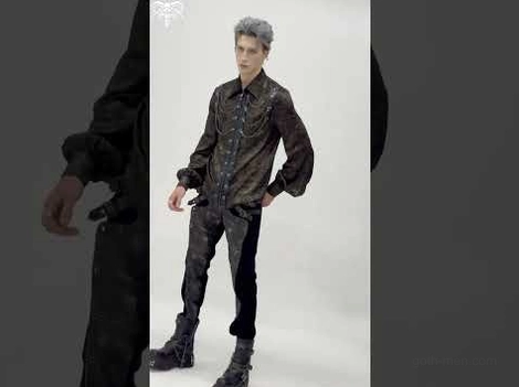 Complete gothic outfit featuring black techwear pants with distressed panels and printed band shirt, full styling reference
