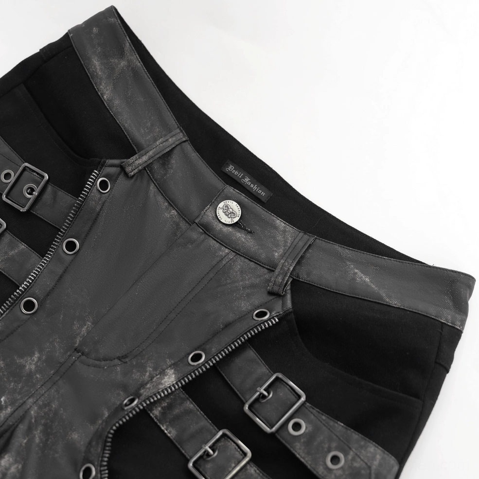Close-up detail of gothic techwear pants waistband showing metal zipper fly and branded button