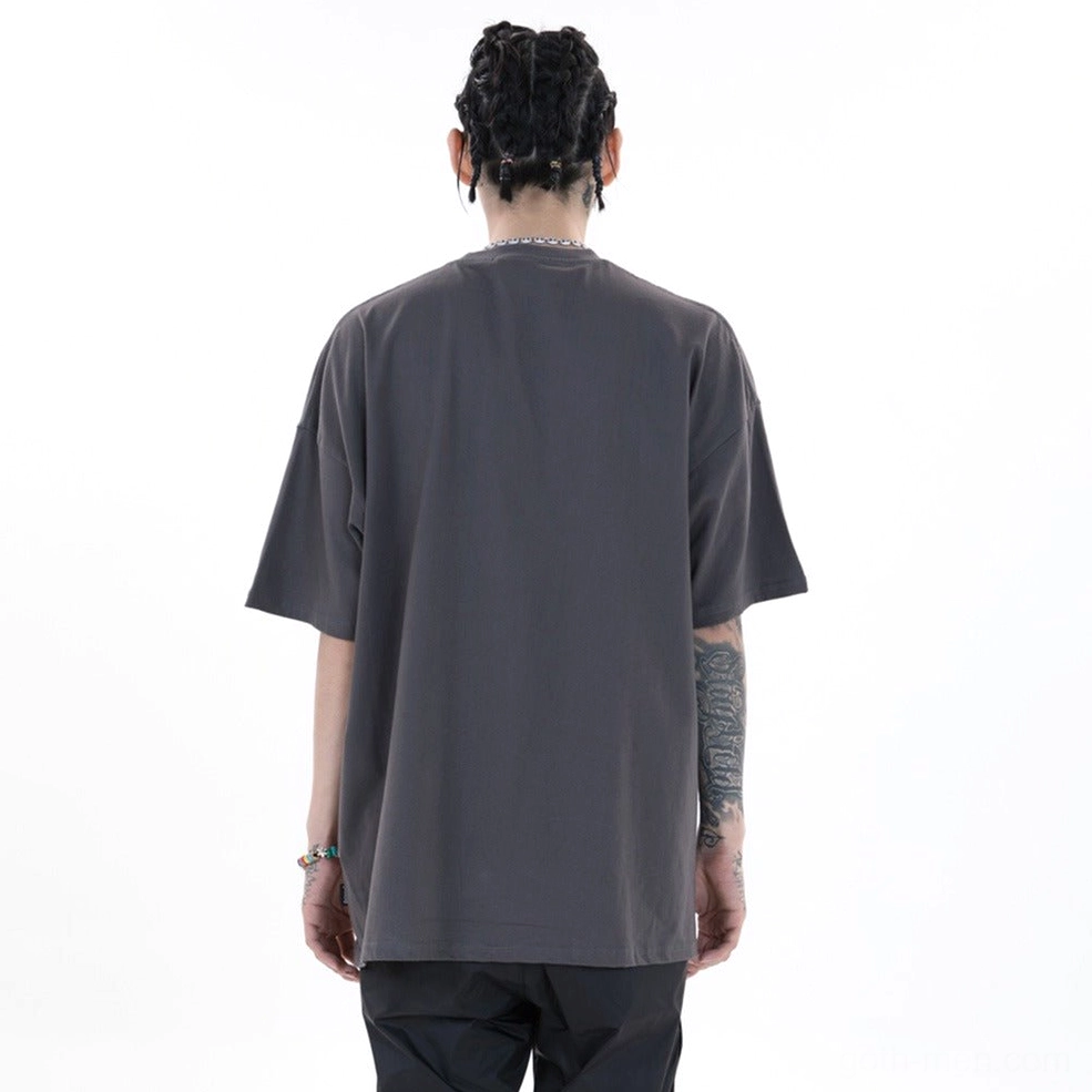 Dark gray gothic graphic tee back view on tattooed male model