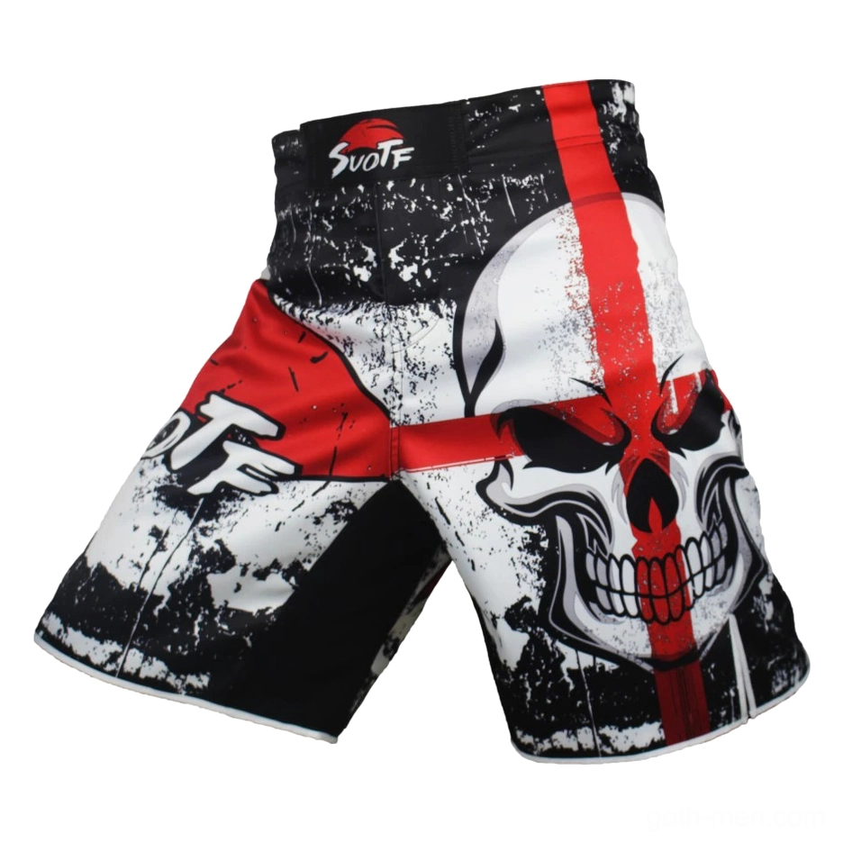Flat lay front view of distressed black gothic shorts with large centered red skull cross print and full graphic display