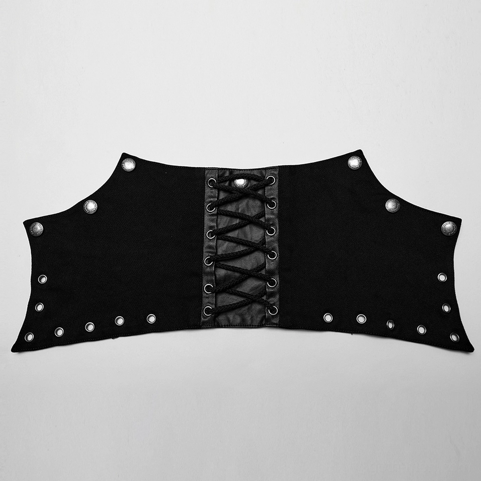 Close-up detail of detachable shoulder piece with lace-up front and metal rivet decorations