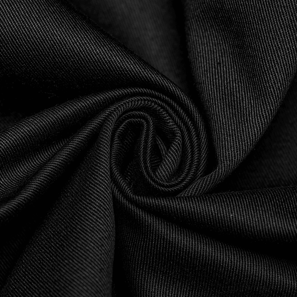 Black twill woven fabric texture close-up showing quality construction and soft drape