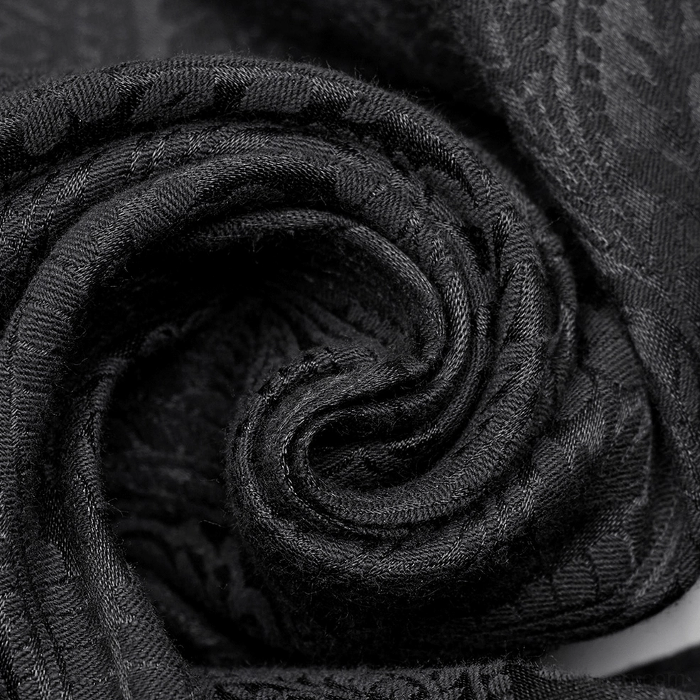 Rear flat lay detail of victorian trousers showing back pockets and paisley jacquard weave