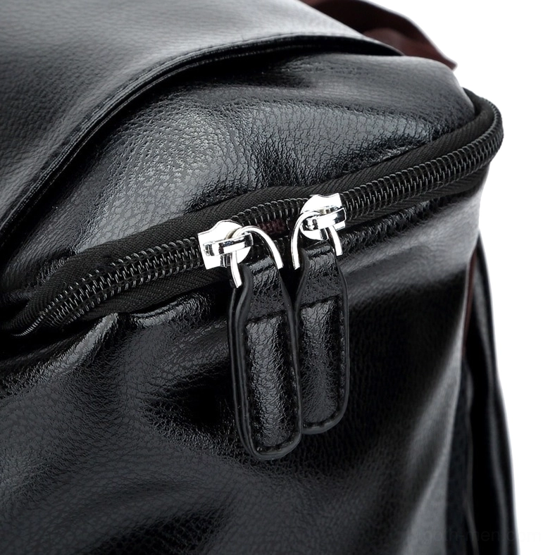 Black gothic leather backpack fully packed demonstrating capacity and practical storage organization