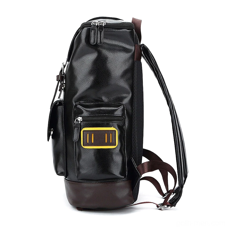 Gothic backpack side profile displaying compartment access points, yellow geometric patch, and rolled closure system