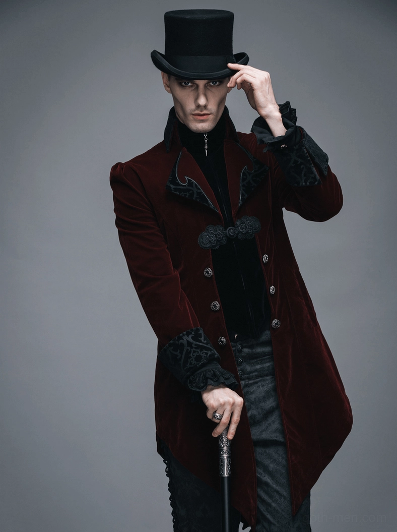 Close-up view of gothic velvet coat tail hem and split design with embroidered accent