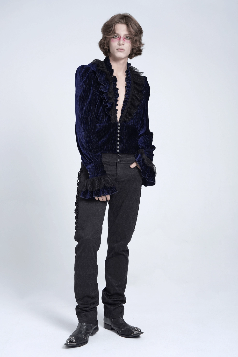 Close detail shot of navy velvet ruffled cuff with mesh lining and black lace trim on gothic shirt