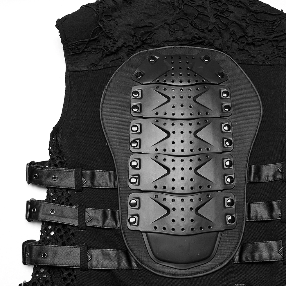 Protective armor plate close-up on cyberpunk gothic vest - perforated back panel with studded leather attachment straps and distressed edges