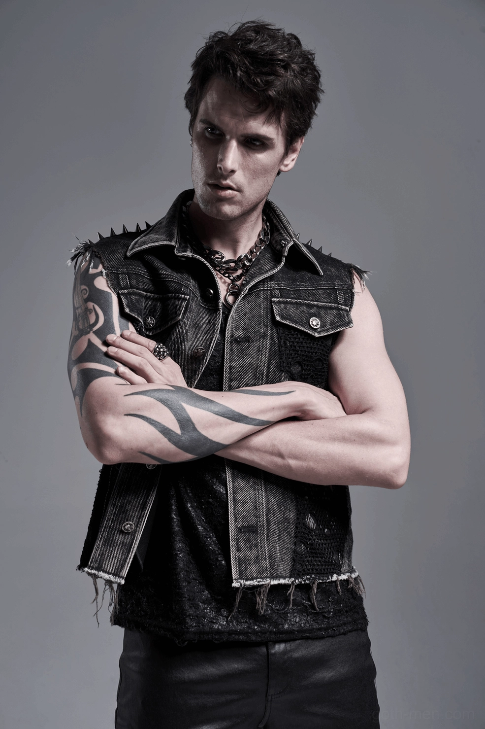 Black gothic denim vest layering shot - showing how vest pairs with alternative fashion styling