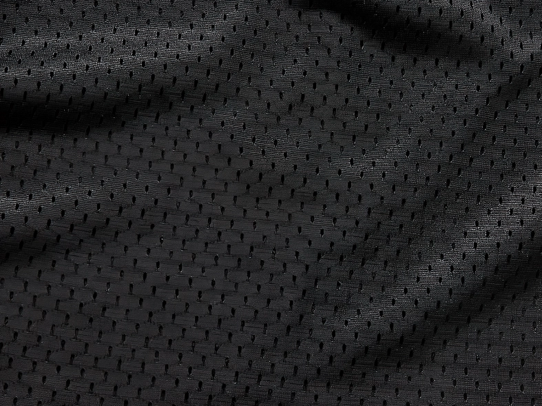 Breathable black mesh lining texture of gothic leather vest interior