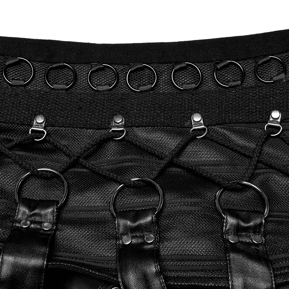 Close-up of gothic vest metal D-ring details showing adjustable stitched leather straps and rings