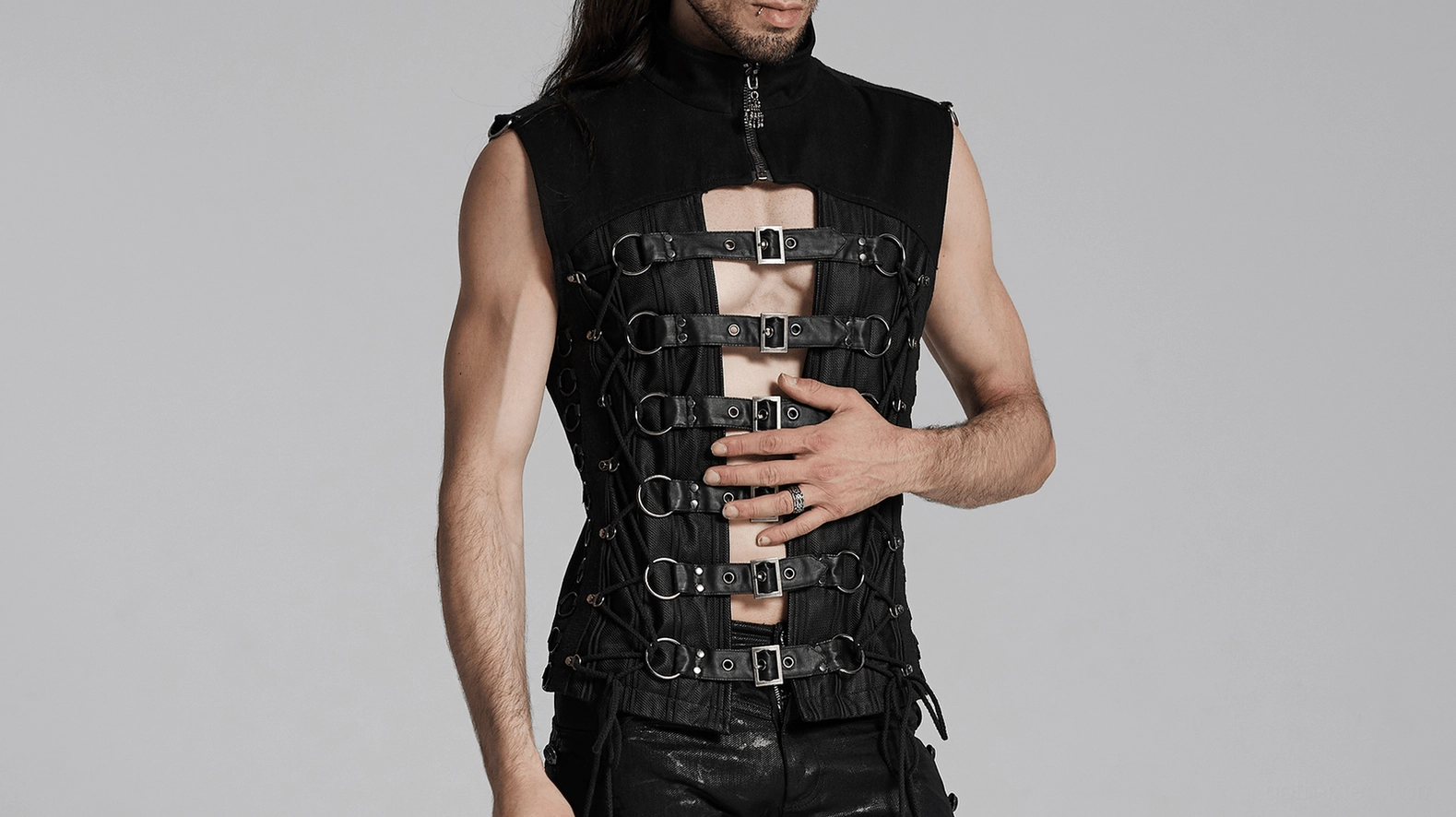 Black gothic vest model back view showing full lace-up corset closure and alternative fashion styling