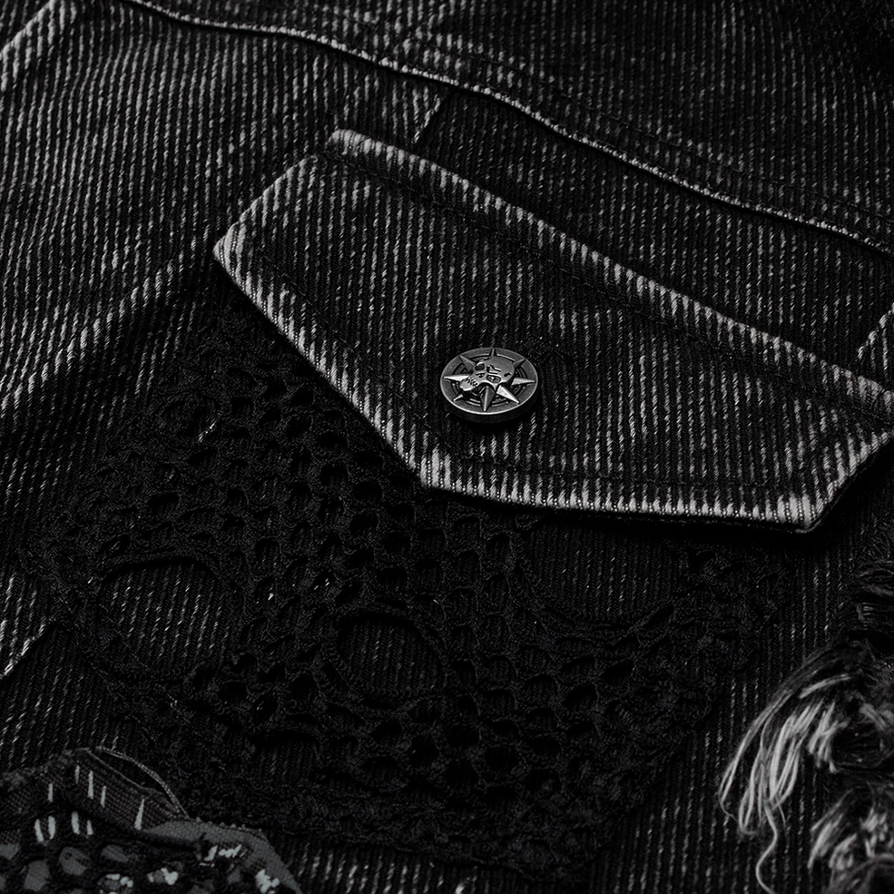 Macro detail of gothic vest pocket - branded metal stud button and mesh fabric with frayed denim edges