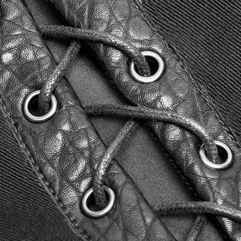 Macro close-up of adjustable side lacing with metal eyelets on gothic armor vest