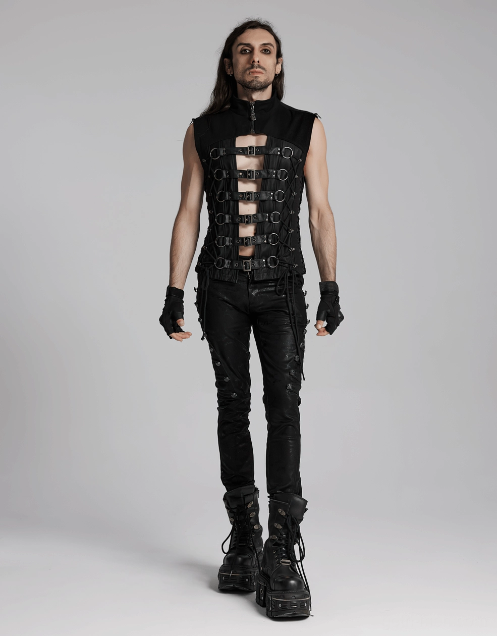 Black gothic lace-up vest showing structural design elements buckles straps and corset-style construction