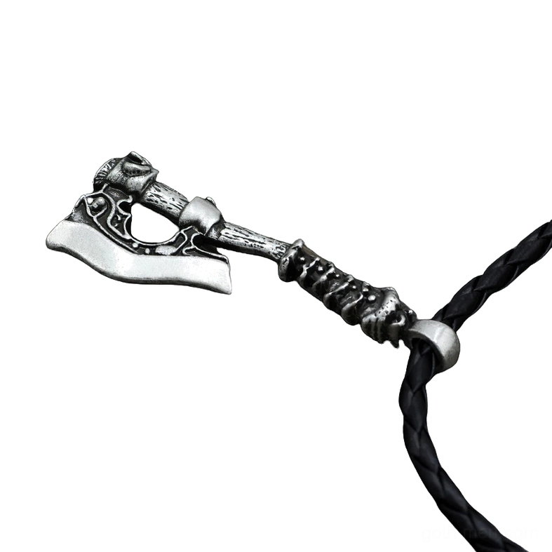 Gothic Viking axe pendant on black braided leather cord with intricate carved details, showing organic dark aesthetic