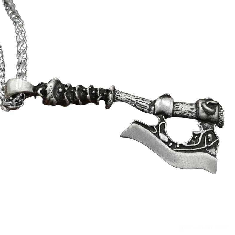 Dark antique silver Viking axe necklace with skull-carved handle and wheat link chain, displayed in flat side view