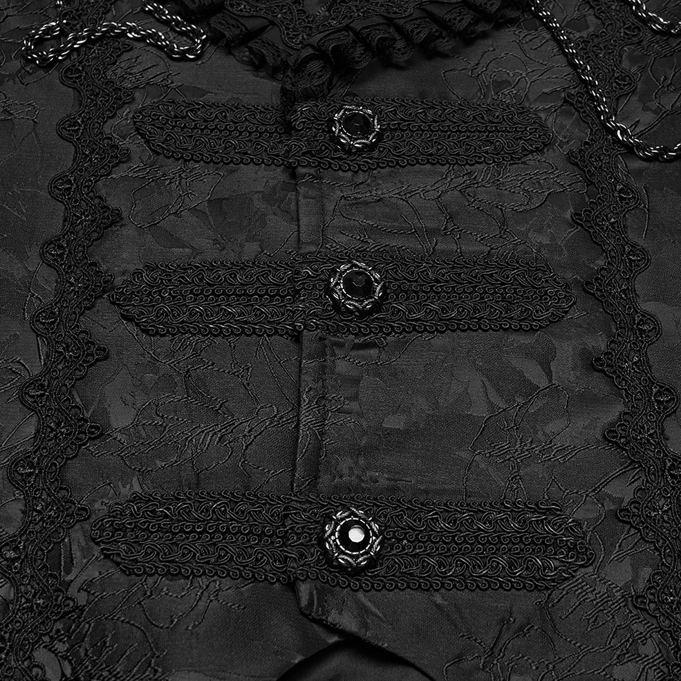 Close-up of gothic waistcoat ornate gem-studded button closure and braided lace trim
