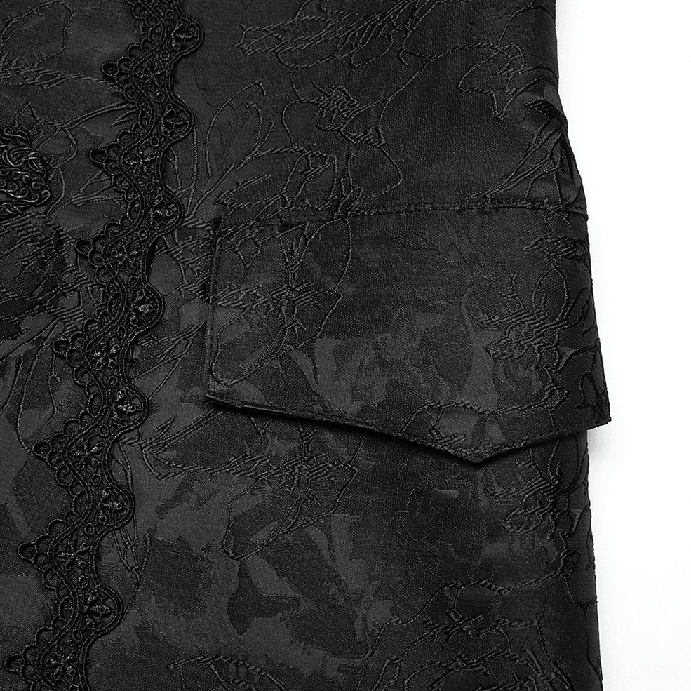 Close-up detail of gothic waistcoat jacquard fabric pattern with lace trim and decorative pocket flap