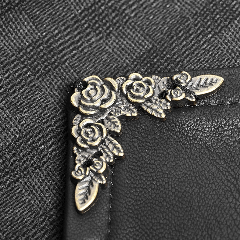 Rose-carved metal ornament lapel decorative detail on black gothic waistcoat stitched leather junction