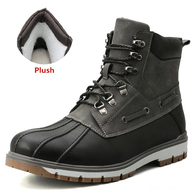 Dark gray and black waterproof gothic winter snow boots with white plush lining close-up