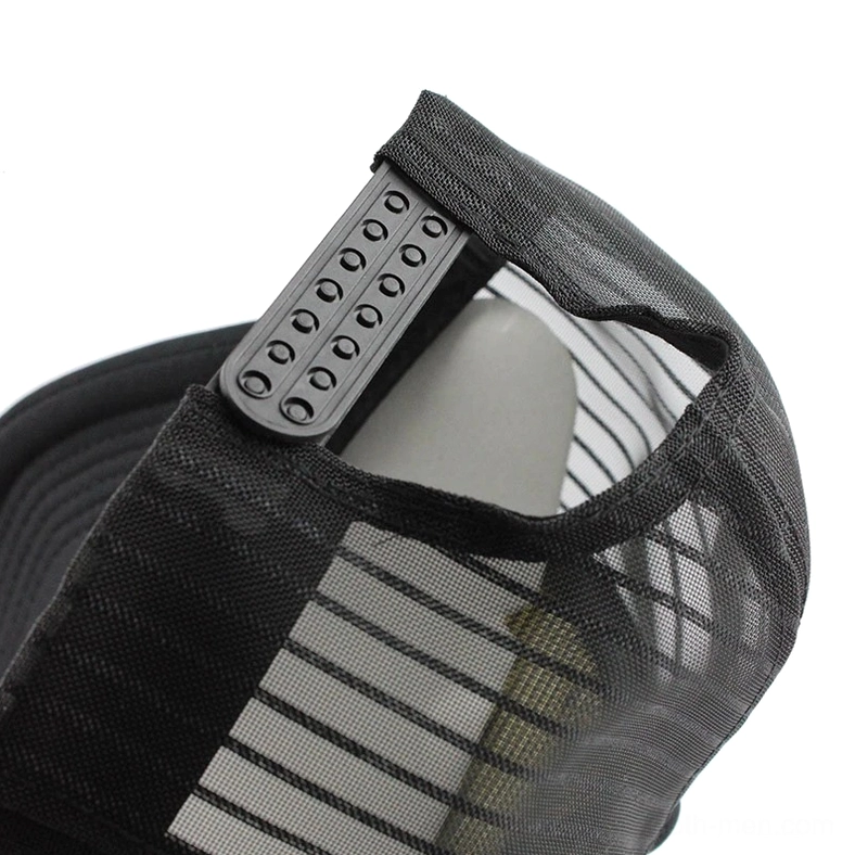 Adjustable plastic snap button closure on gothic mesh cap showing multiple adjustment holes for customizable fit