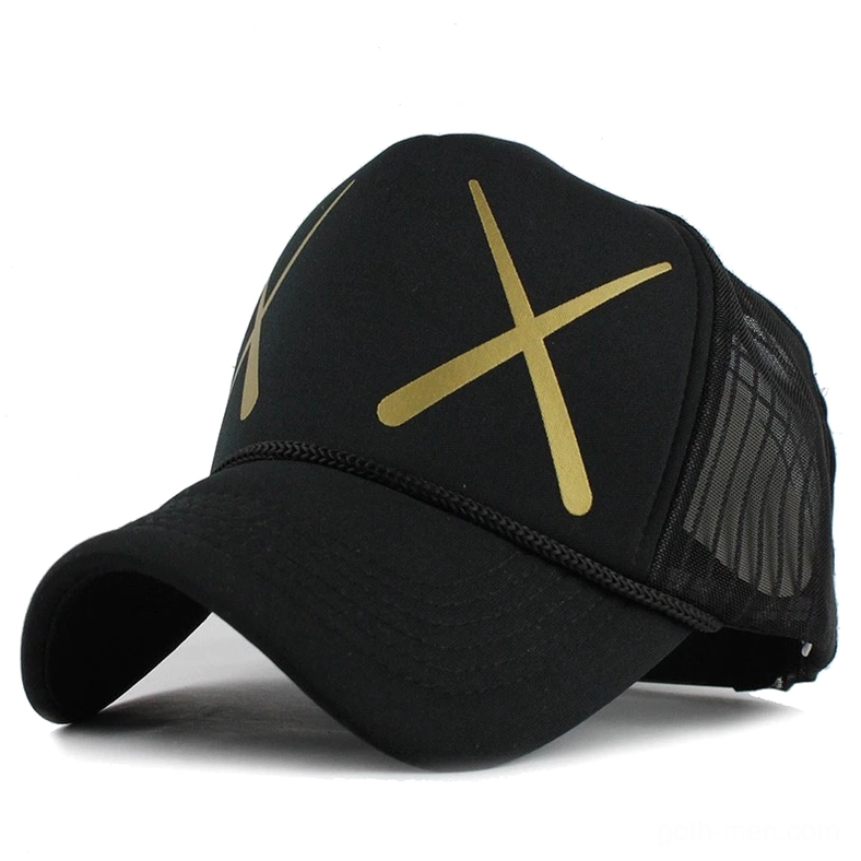 Black gothic mesh baseball cap with golden XX cross print, front oblique view showcasing 5-panel trucker design and adjustable mesh back